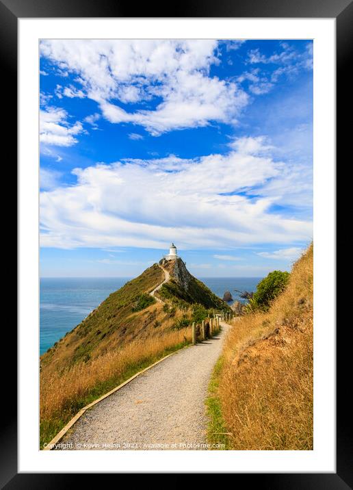 Pathway leading up to the lighthouse Framed Mounted Print by Kevin Hellon
