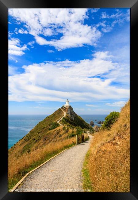 Pathway leading up to the lighthouse Framed Print by Kevin Hellon