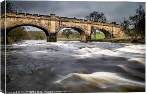Aqueduct/bridge  over the river Wharfe in the Yorkshire dales  Canvas Print by PHILIP CHALK