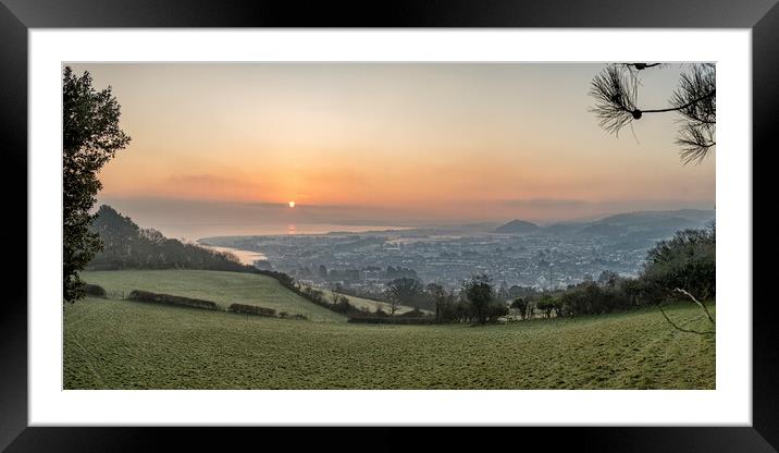 Colourful winter sunrise over Minehead Framed Mounted Print by Shaun Davey