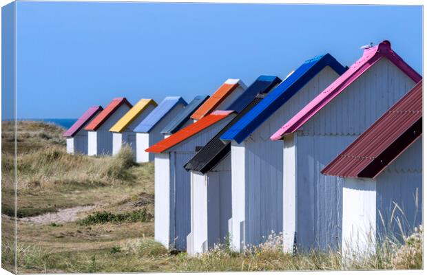 Colourful Beach Huts in Normandy Canvas Print by Arterra 