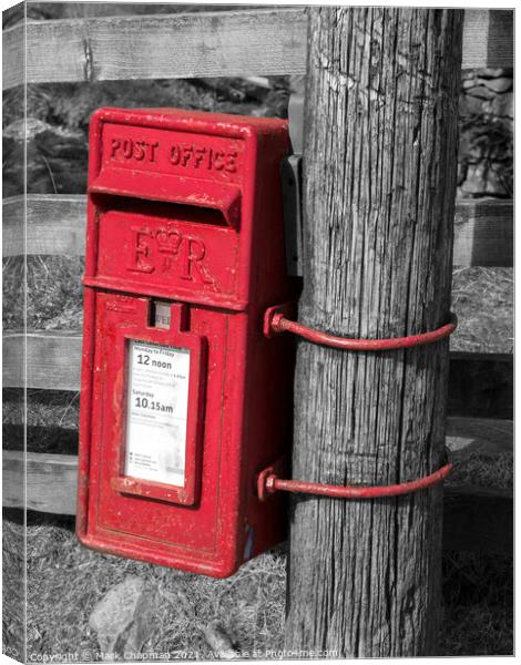 An old red English post box fixed to a wooden post Canvas Print by Photimageon UK