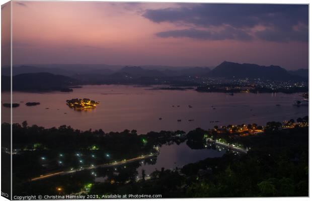Twilight view of Lake Pichola and Udaipur in India Canvas Print by Christina Hemsley