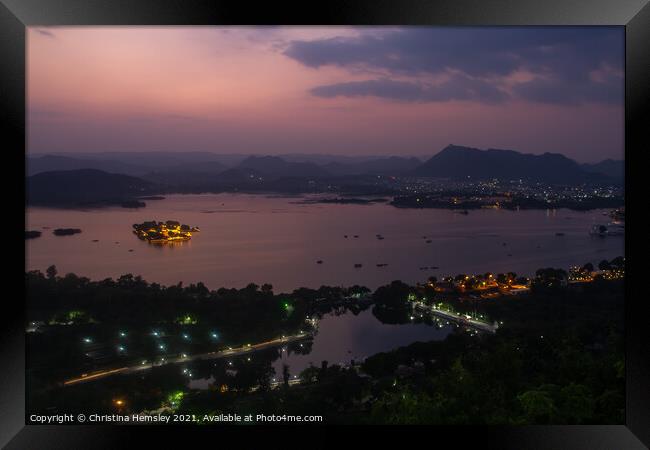 Twilight view of Lake Pichola and Udaipur in India Framed Print by Christina Hemsley