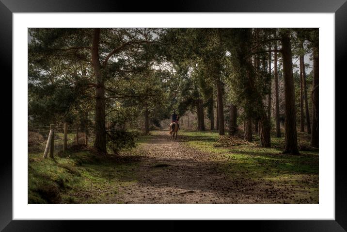 Riding into the distance  Framed Mounted Print by Jon Fixter