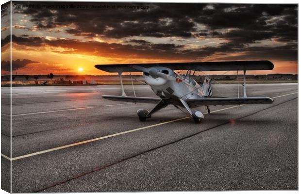 A small airplane sitting on the tarmac of an airpo Canvas Print by maka magnolia