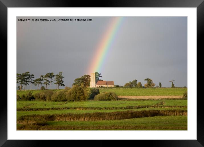 Rainbow shining on Ramsholt church Framed Mounted Print by Ian Murray