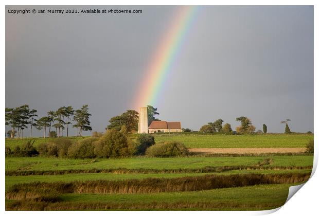 Rainbow shining on Ramsholt church Print by Ian Murray