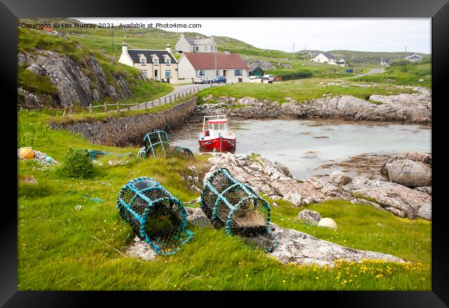 Fishing boat and lobster pots, Island of Barra, Outer Hebrides, Scotland, UK Framed Print by Ian Murray
