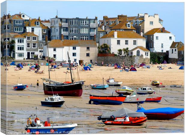 St. Ives harbour beach in Cornwall. Canvas Print by john hill