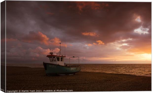 Beached. Fishing boat on shingle beach Canvas Print by Martin Tosh