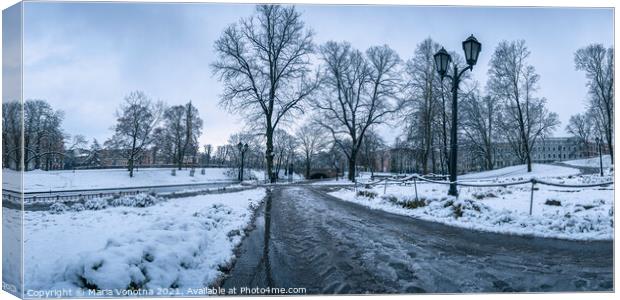 Covered in snow city park in winter in Riga, Latvia Canvas Print by Maria Vonotna