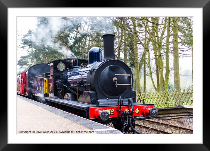 Steam train at Holt Station in North Norfolk Framed Mounted Print by Clive Wells