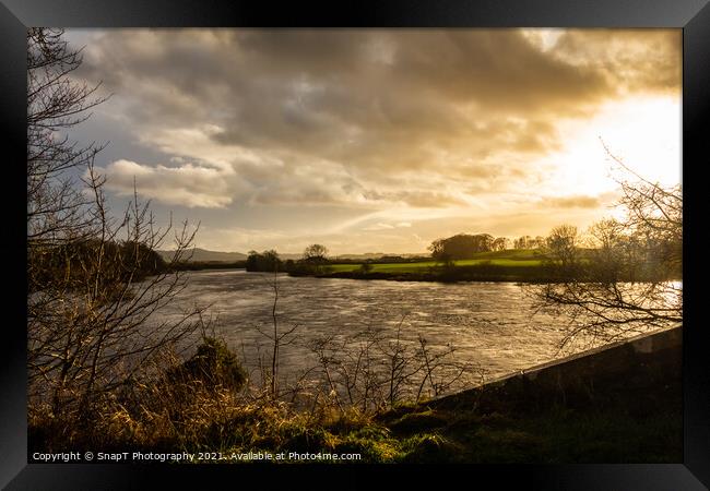 Sun setting over the River Dee at Glenlochar Bridge, on a winter afternoon Framed Print by SnapT Photography