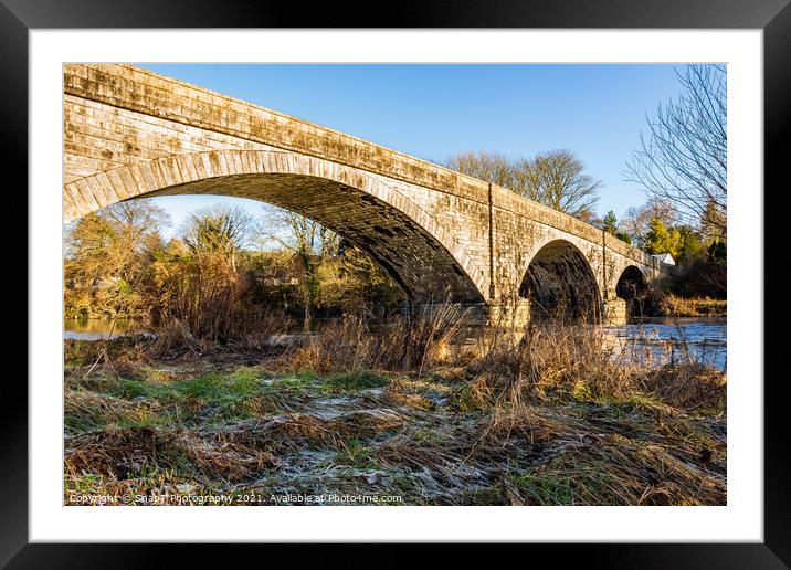 The Ken Bridge on a winters day, with frost on the ground, beside the river Framed Mounted Print by SnapT Photography