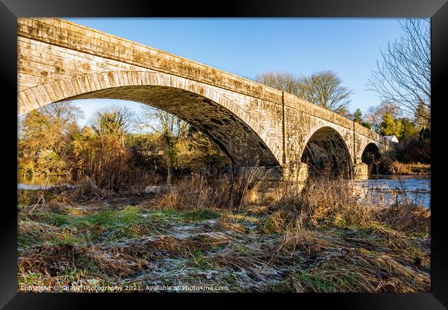 The Ken Bridge on a winters day, with frost on the ground, beside the river Framed Print by SnapT Photography