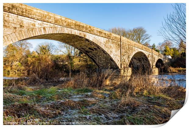 The Ken Bridge on a winters day, with frost on the ground, beside the river Print by SnapT Photography