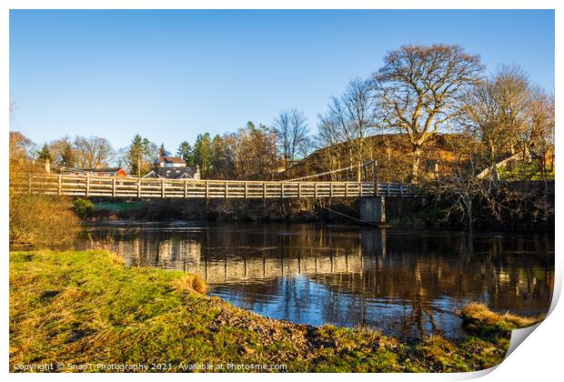 Boat Weil Wooden Suspension Bridge reflecting over the Water of Ken, Scotland Print by SnapT Photography