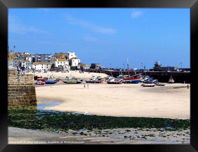 Low tide at St. Ives in Cornwall. Framed Print by john hill