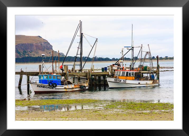  Fishing boats moored at a pier Framed Mounted Print by Kevin Hellon