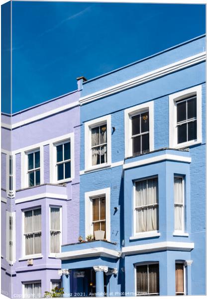 Colorful townhouses near Portobello Road in Notting Hill, London Canvas Print by Juan Jimenez