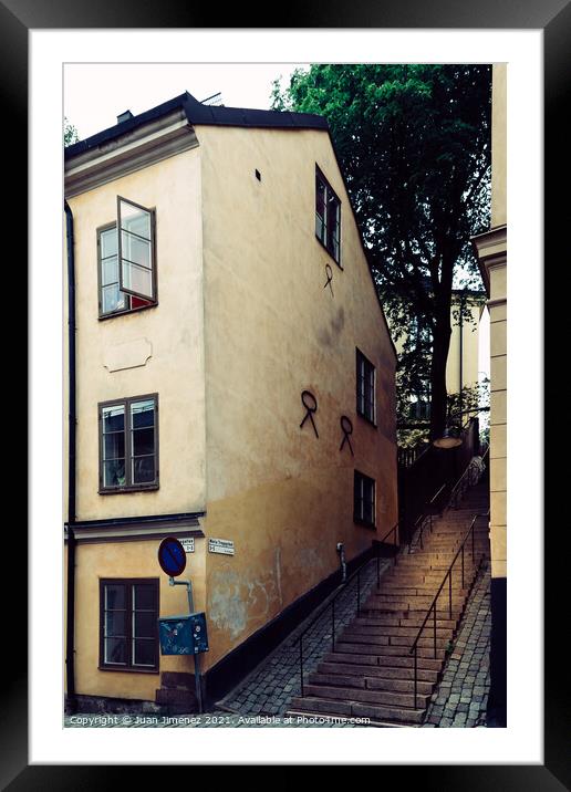 Picturesque cobblestoned street and steps with colorful houses i Framed Mounted Print by Juan Jimenez