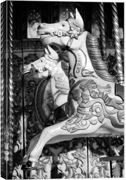Horses from a Carousel in Black and White, Brighton, Sussex Canvas Print by Neil Overy