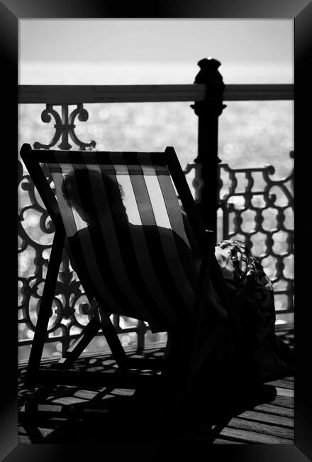 An Afternoon Nap in Brighton Framed Print by Neil Overy