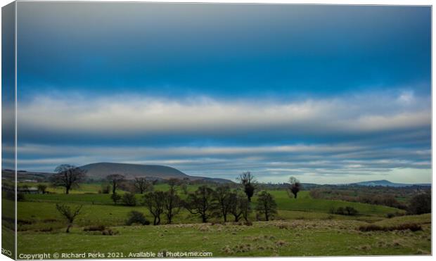 Clouds over Pendle Hill Canvas Print by Richard Perks