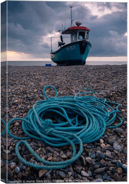 Ropey. Fishing boat and rope on shingle beach Canvas Print by Martin Tosh