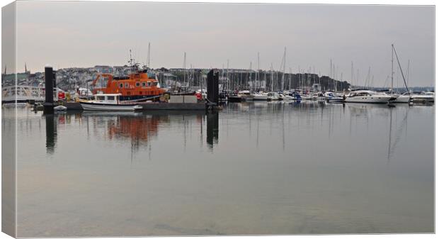 Lifeboat and sailing boats in Brixham marina Canvas Print by mark humpage