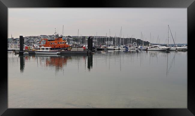 Lifeboat and sailing boats in Brixham marina Framed Print by mark humpage