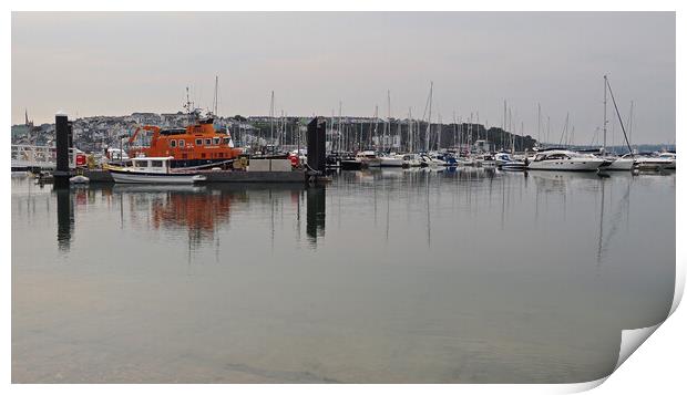 Lifeboat and sailing boats in Brixham marina Print by mark humpage