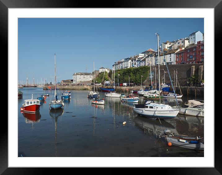 Sailing boats moored in Brixham harbour Framed Mounted Print by mark humpage
