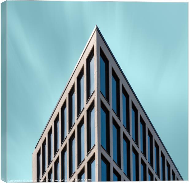 Abstract Detail of Minimalist Building Against Teal Blue Sky Canvas Print by Juan Jimenez