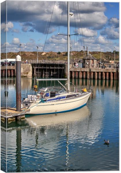 A yacht moored in Padstow Harbour, Cornwall. Canvas Print by Gordon Maclaren