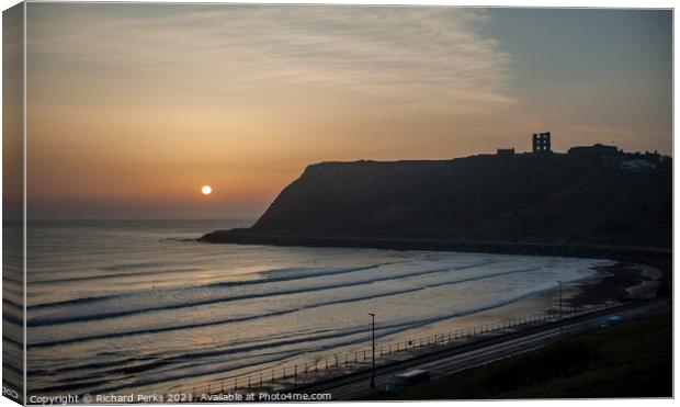 Misty sunrise at Scarborough North Bay Canvas Print by Richard Perks