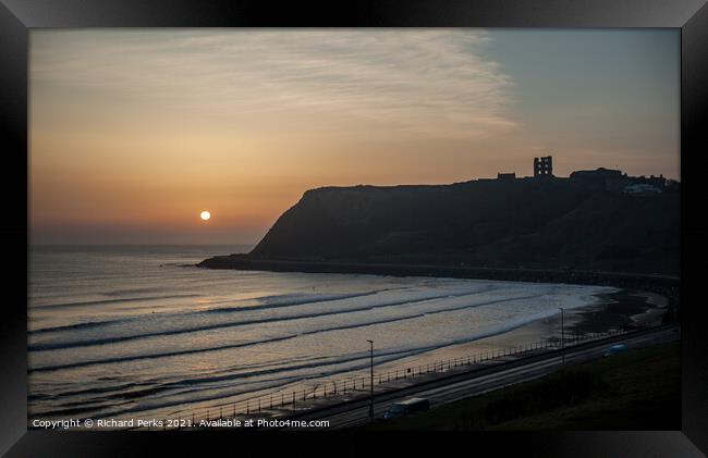 Misty sunrise at Scarborough North Bay Framed Print by Richard Perks