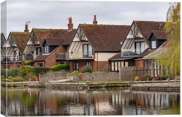 Riverside cottages on the bank of the River Bure, Horning Canvas Print by Chris Yaxley