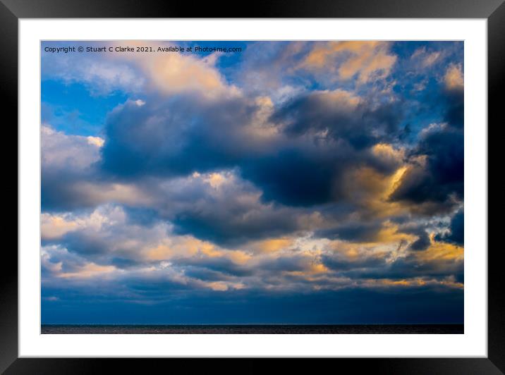 Sunset in the clouds Framed Mounted Print by Stuart C Clarke