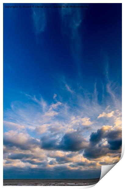 Sunset in the clouds Print by Stuart C Clarke