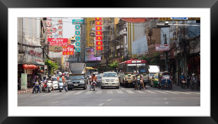 Traffic waits at traffic lights Framed Mounted Print by Kevin Hellon