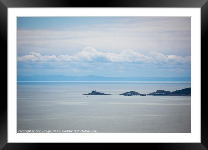 Mumbles lighthouse and pier viewed from Pantycelyn Road Framed Mounted Print by Bryn Morgan