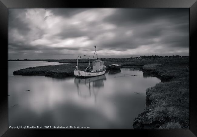 Patience. Fishing boat in salt marsh Framed Print by Martin Tosh