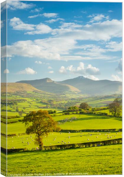 Late spring snow on the Brecon Beacons Canvas Print by Justin Foulkes