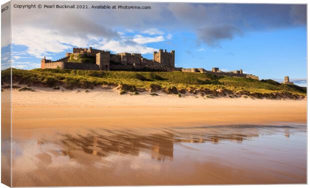 Bamburgh Castle Reflected on Northumberland Coast Canvas Print by Pearl Bucknall
