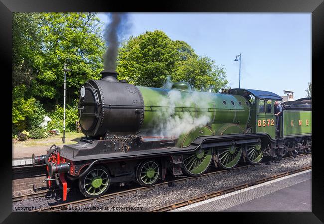Old steam train fired up and ready to go. Framed Print by Clive Wells