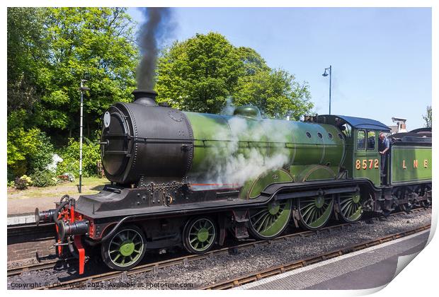 Old steam train fired up and ready to go. Print by Clive Wells