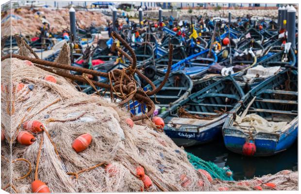 Anchors and nets in front of Agadir harbour Canvas Print by Jason Wells