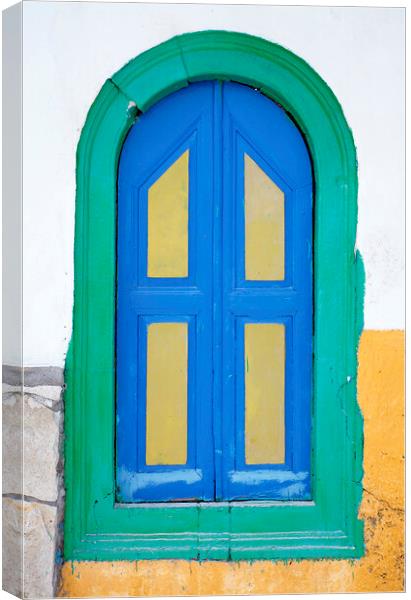 Colorful old wooden window shutter, Corfu, Greece Canvas Print by Neil Overy